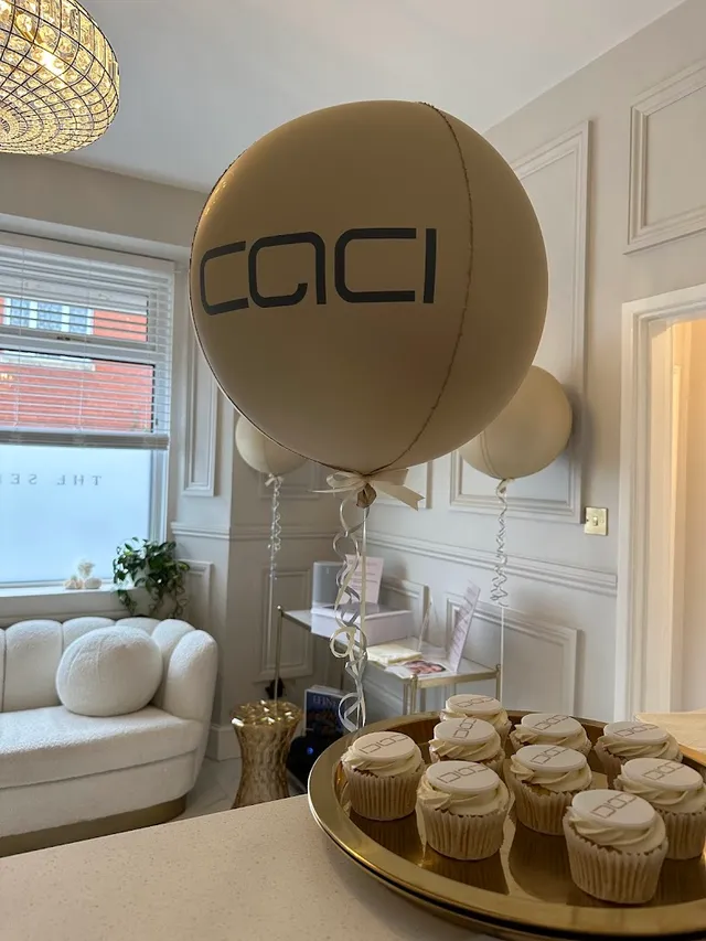 The clinic dressed for a CACI launch with balloons and cupcakes