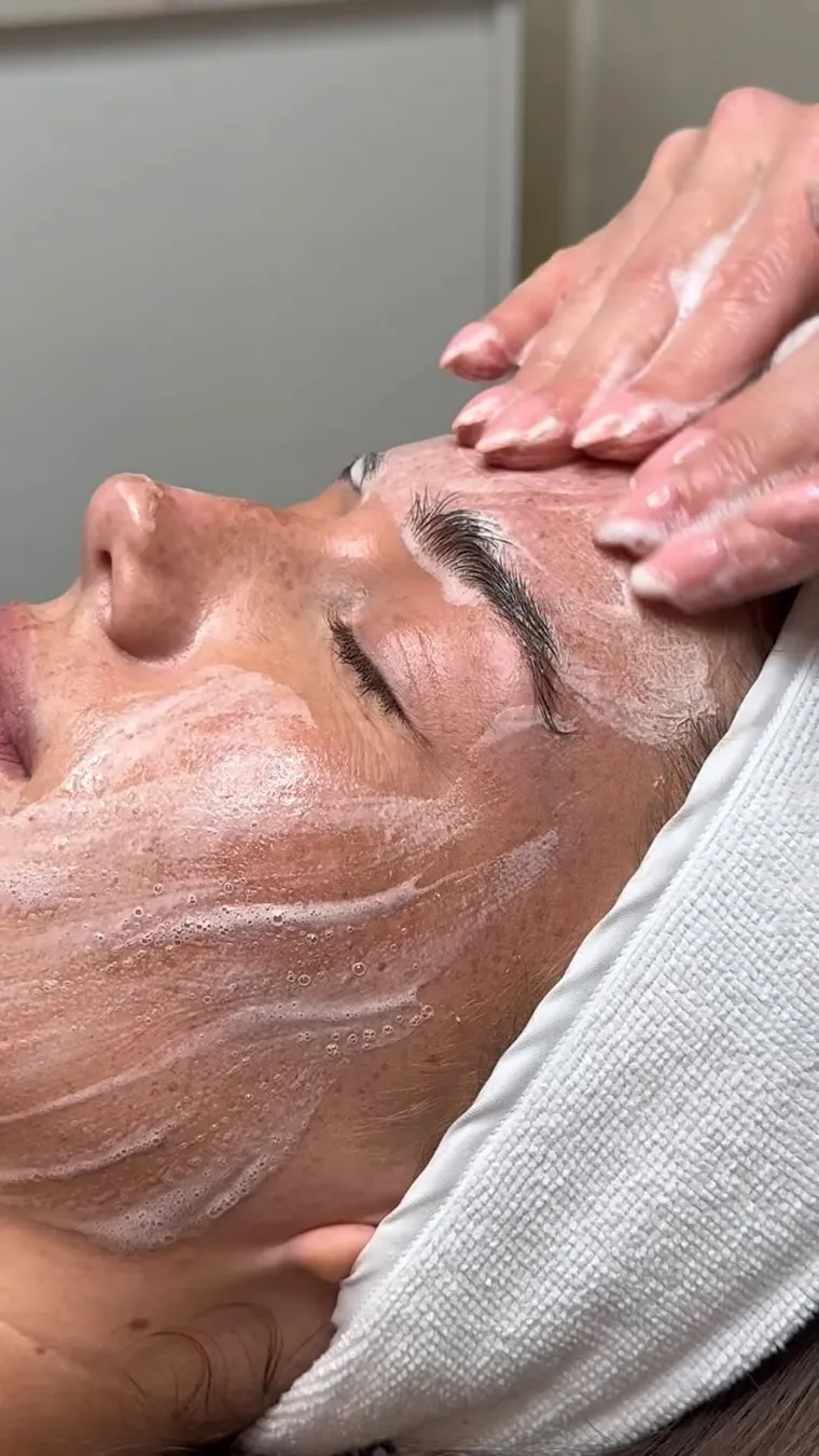A gentle double cleanse during a signature facial at The Self-Care Clinic